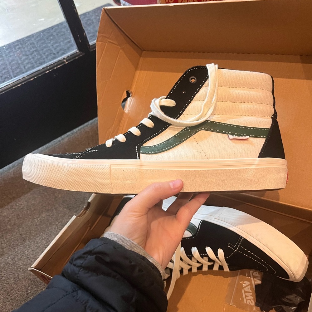 Vans Black, White, and Green High-Top Sneakers